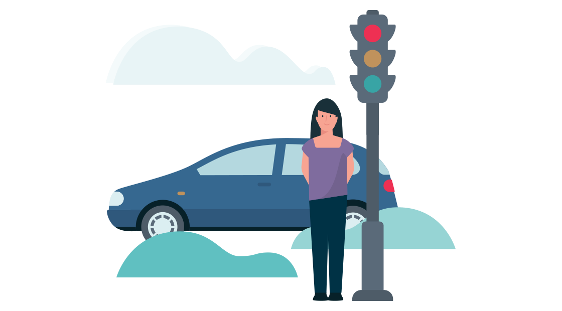 Een man zit in een auto achter het stuur